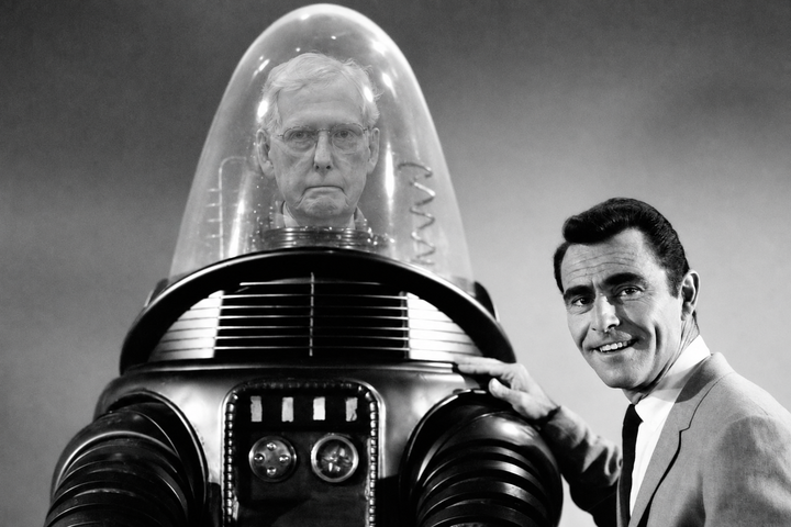 Mitch McConnell with improved mobility by placing his head in Robby the Robot.